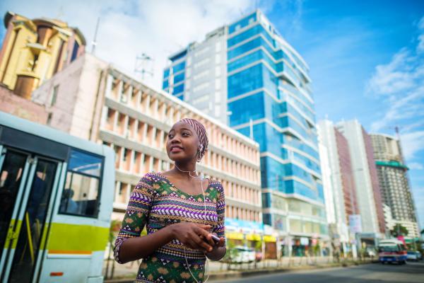 Young confident African woman in city centre